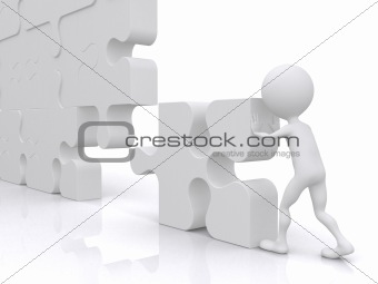 business teamwork - business person building a puzzle which was 
