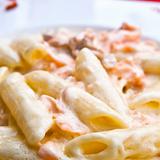 close-up of plate of pasta and smoked salmon