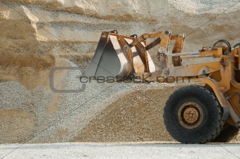 Bulldozer in quarry