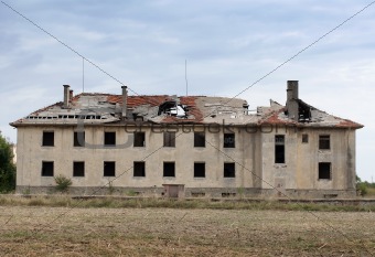 Old building with destroyed roof.