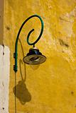 old curved street lamp
