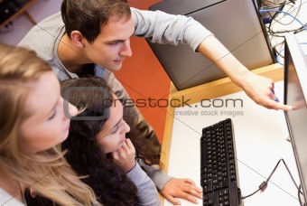 Fellow students using a computer