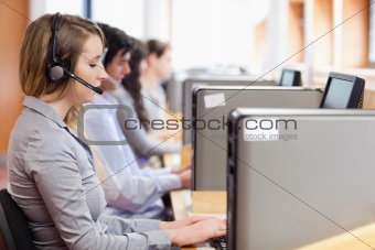 Operators using a computer in call center