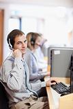 Portrait of a customer assistant using a headset