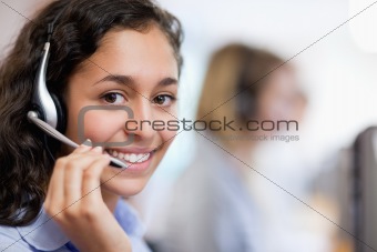 Close up of a smiling customer assistant