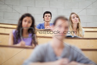 Focused students listening during a lecture