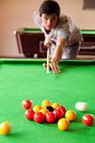 Portrait of a man playing snooker