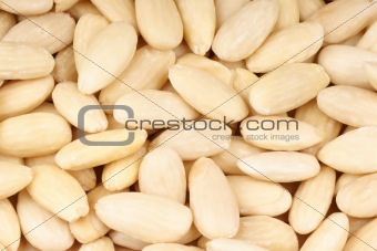 Peeled sweet almonds background
