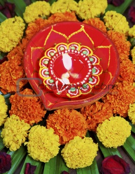 IMG_4586 portrait Hindu floral rangoli Diva marigolds