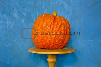 still-life with orange pumpkin