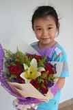 Girl holding bouquet