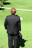 rear view of businessman on hill