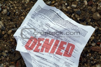 Crumpled rejected loan application