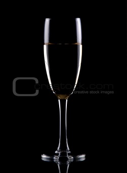 Glass of wine isolated over black background