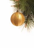 New Year's gold sphere on a pine branch