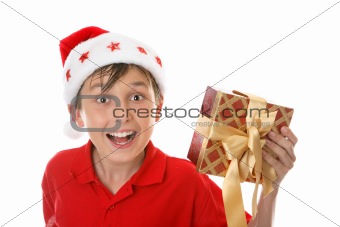 Exuberant child with Christmas gift