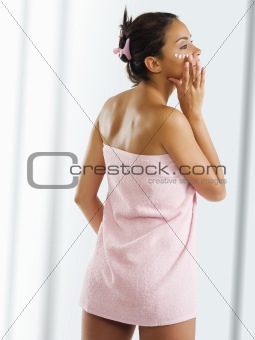 girl with pink towel
