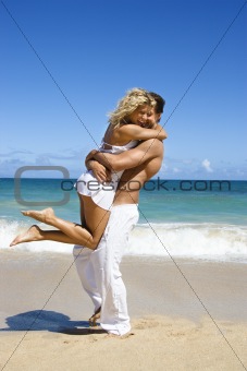Couple in embrace.