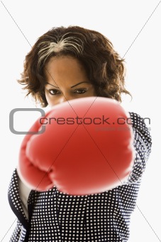 Punching businesswoman.