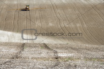 Tractor Spraying Field