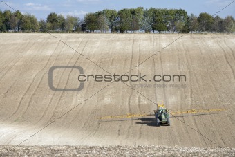 Tractor Spraying Field