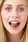 Portrait Of Young Woman Eating Chocolate