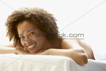Young Woman Relaxing On Massage Table