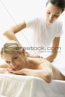 Young Woman Enjoying Massage