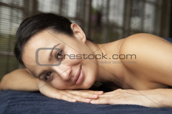 Young Woman Relaxing On Massage Table