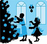 silhouette of kids near a Christmas tree