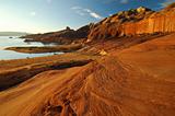 Red sandstone formations along the shores of Lake Powell