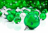 Green christmas ornament baubles with star background