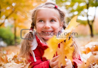 Little girl in autumn