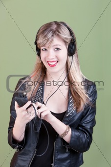 Teenaged Girl with Handheld Phone or Audio Device