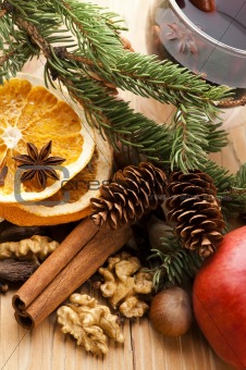 Different kinds of spices, nuts and dried oranges - christmas decoration
