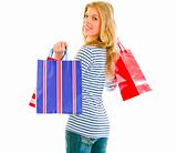 Smiling teen girl with shopping bags
