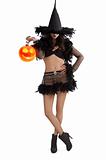 girl in halloween dress standing with party ball