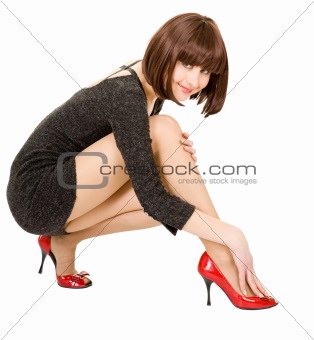 woman flirts squatting 