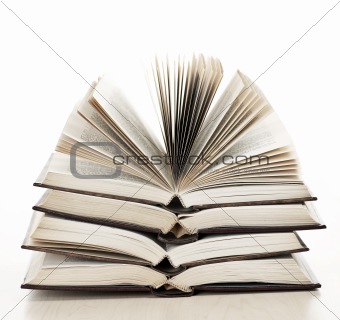 Stack of open books