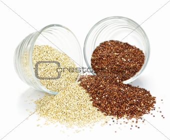 Red and white quinoa grain in bowls