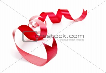 Curled red holiday ribbon