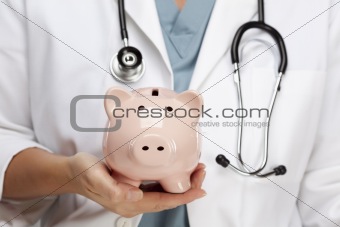 Female Doctor with Stethoscope Holding Piggy Bank Abstract.