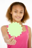 Young Girl Holding Sale Tag