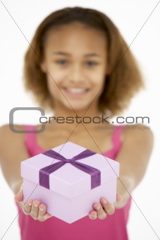 Young Girl Holding Wrapped Gift