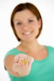 Woman Holding Vitamin Capsules