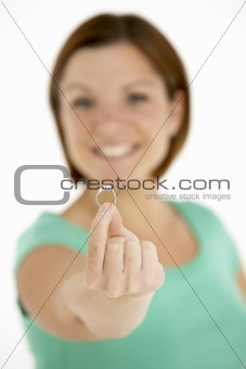 Woman Holding Engagement Ring