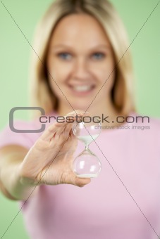 Woman Holding Hourglass