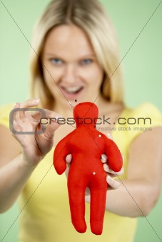 Woman Holding Voodoo Doll
