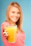 Teenage Girl Holding Glass Of Juice
