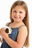 Young Girl Holding Pet Guinea Pig